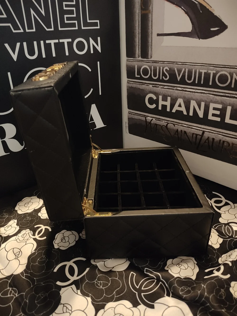 Black Quilted Jewelry Case with Gold Logo Accents And Mirror